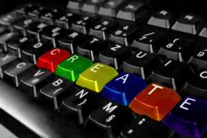 computer keyboard with the word 'create' in primary colors