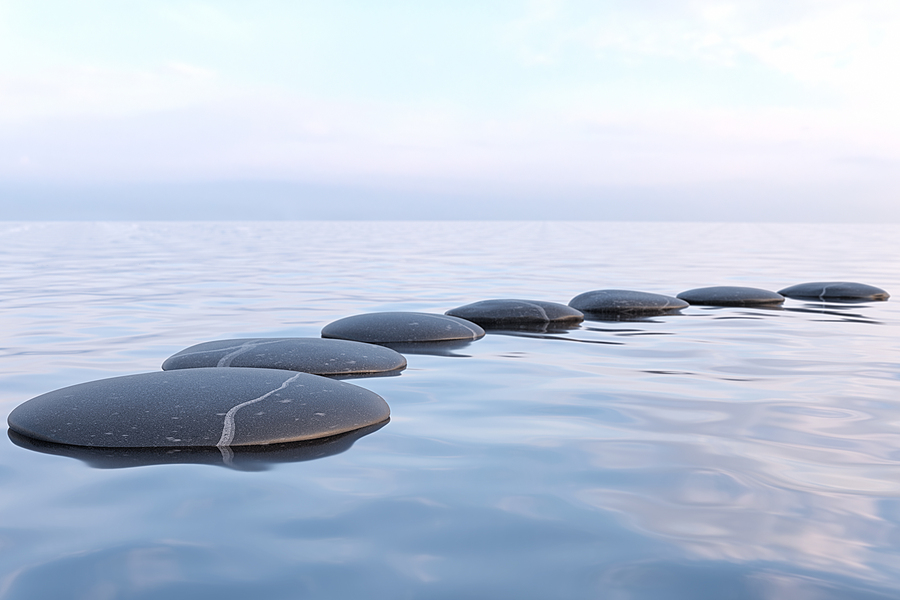 3d rendering of Zen stones in water with reflection - peace meditation relaxation concept